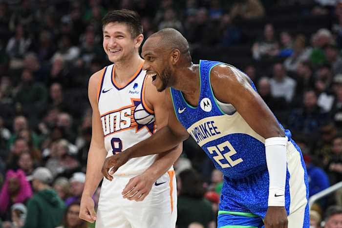  Phoenix Suns guard Grayson Allen (8) and former teammate Milwaukee Bucks forward Khris Middleton (22)